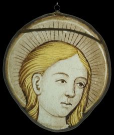 A beautiful Stained Glass Roundel depicting an Angel circa 1550