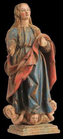 An 18th Century carved and polychromed figure of the Immaculate Conception