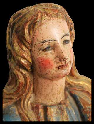 An 18th Century carved and polychromed figure of the Immaculate Conception